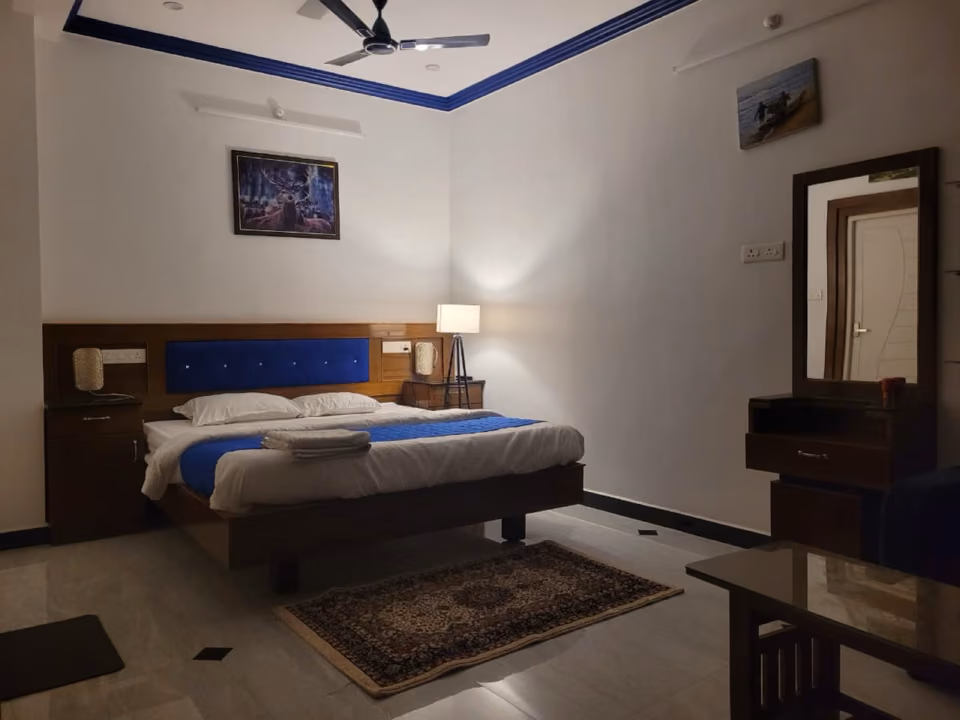 King bedroom with warm evening lighting